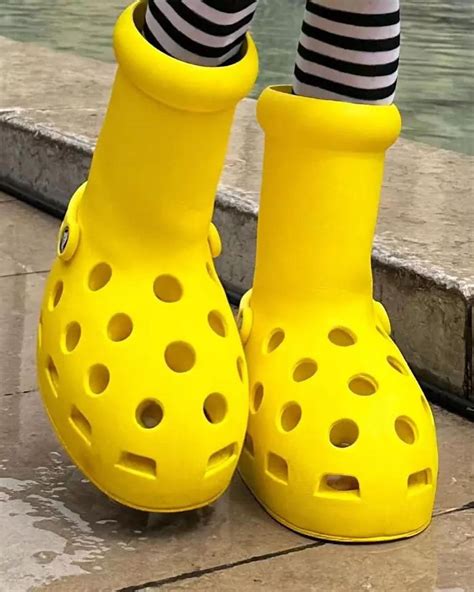 crocs yellow boots art collective.